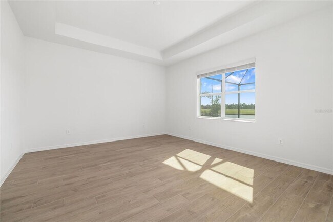 Building Photo - 5604 Lightning Whelk Ln