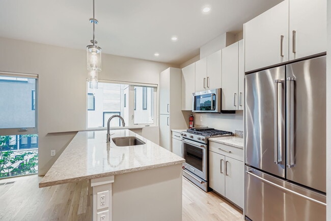 Building Photo - Swanky 1BR – New, Private Garage, Storage,...