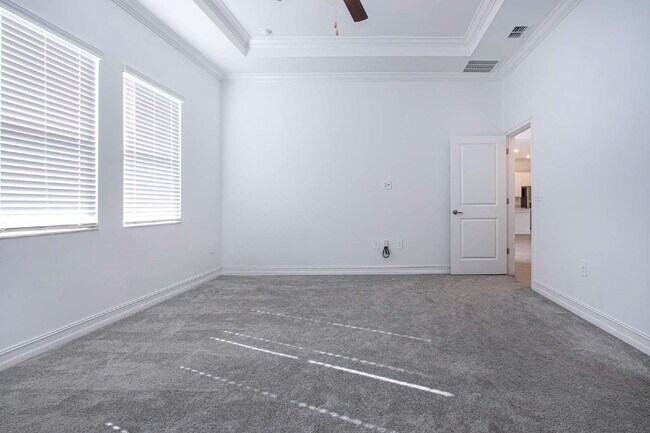 Building Photo - Spacious Like New 4-Bedroom Oasis with 3 F...