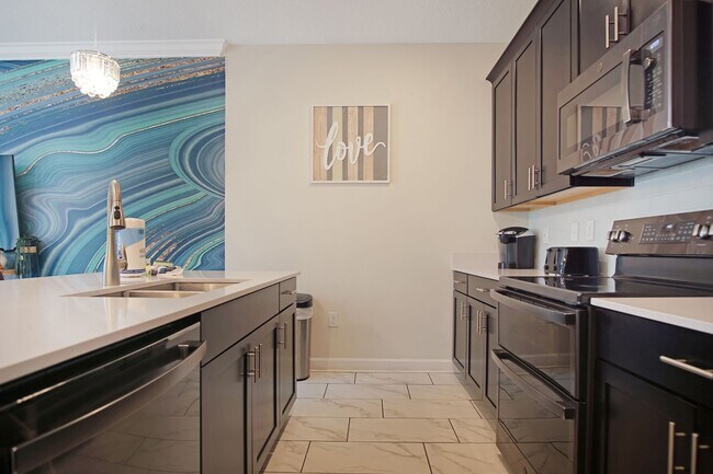 Building Photo - Pool Townhome Now Available