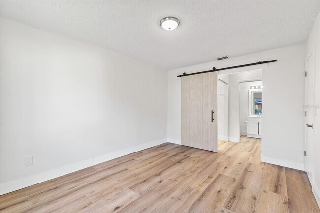 Building Photo - 5606 Blue Shadows Ct