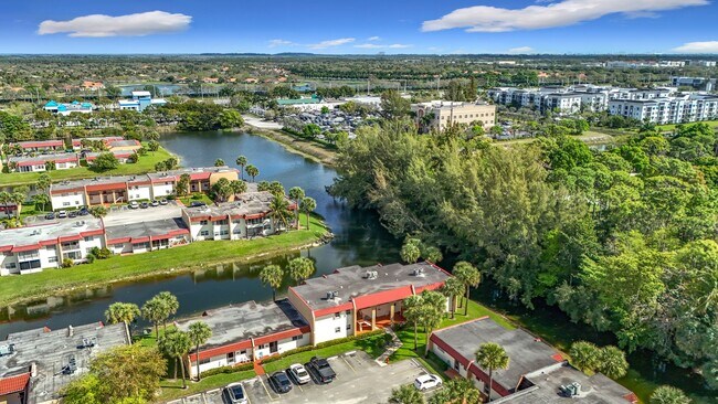 Building Photo - Desirable 55 plus community condo unit with a view of the lake on the 2nd Floor.