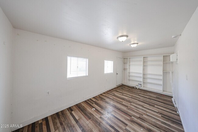 Building Photo - 3408 W Port Au Prince Ln