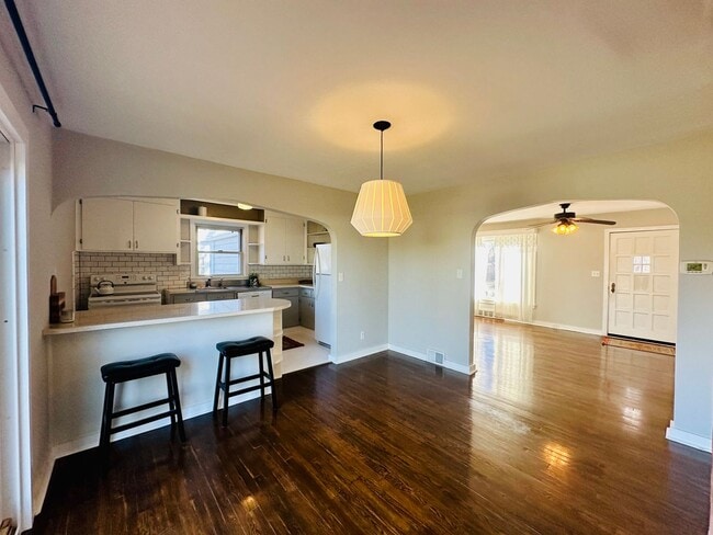 Building Photo - {8520} Charming Four Bedroom in Fantastic Location + Two Main Floor Bedrooms + Hardwood Floors + ...