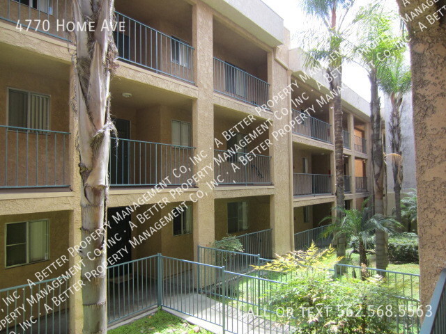 Building Photo - Gated Upper 2 Bedroom Available - Home Gar...