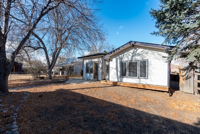 Building Photo - “PRICE DROP!!!” Live in the Heart of Old Town Lafayette | Spacious 4BR with Private Backyard & Ga...