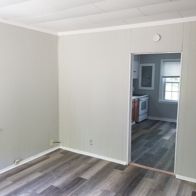 Living Room Into Kitchen - 100 Stone Dr