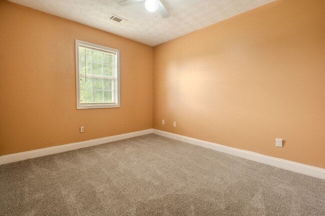 Building Photo - Spacious 4BR/3BA Townhome | Pet Friendly | Washer & Dryer Included | $1,600/mo
