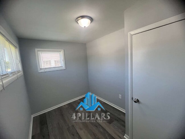 Building Photo - "Charming 3-Bed Home with Partially Finished Basement & Gleaming Hardwood Floors in Hammond - 226...