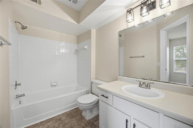 Building Photo - Location! Beautifully located condo just minutes from Orlando International Airport,