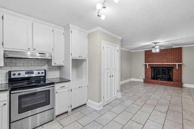 Building Photo - Elon - Large Brick Home, Hardwoods, Granite Counter-Tops, SS Appliances, Fire Place, Carport - Mu...