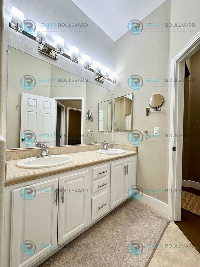 Building Photo - Open Kitchen, Expansive Living, and Covered Patio in Tranquil South Reno Near Trails, Parks & Sho...