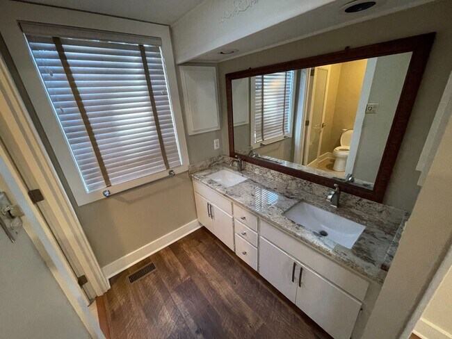 Building Photo - 3 Bedroom 3 Bath Beauty on Golf Course with Wet Bar and Storage Building