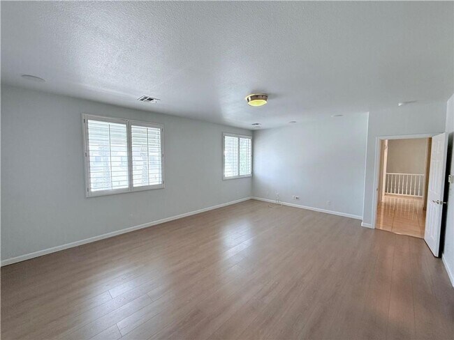 Building Photo - Amazing condominium in gated upscale neigh...