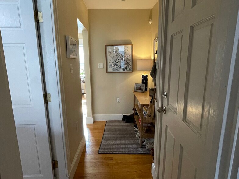 Hallway leading to full sized bath and large bedroom - 34 F St