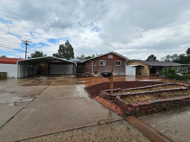 Primary Photo - 4-Bedroom Home with In-Ground Pool, Solar ...