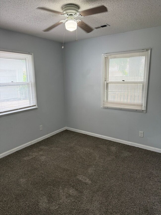 Building Photo - 3BR/1BA with overside detached garage read...