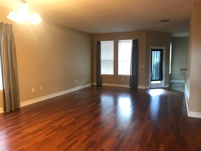 Building Photo - Charming 3/2 home w/ formal office/4th bedroom and fenced yard in Harmony