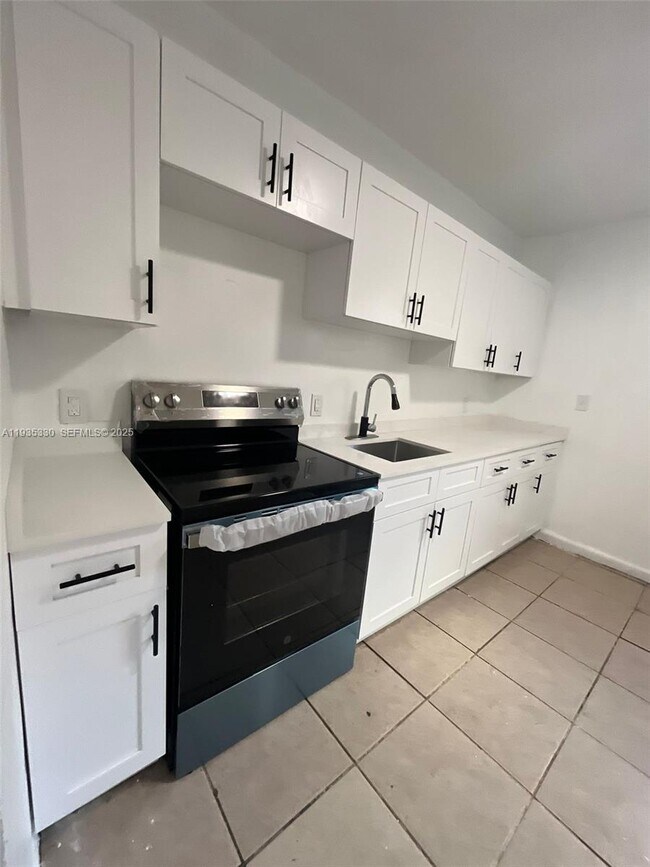 Building Photo - 6345 N Miami Ave