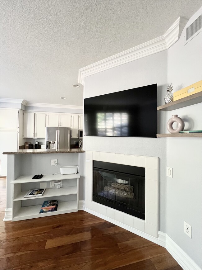 Gas fireplace; 50 inch TV - 27 Chaumont Cir