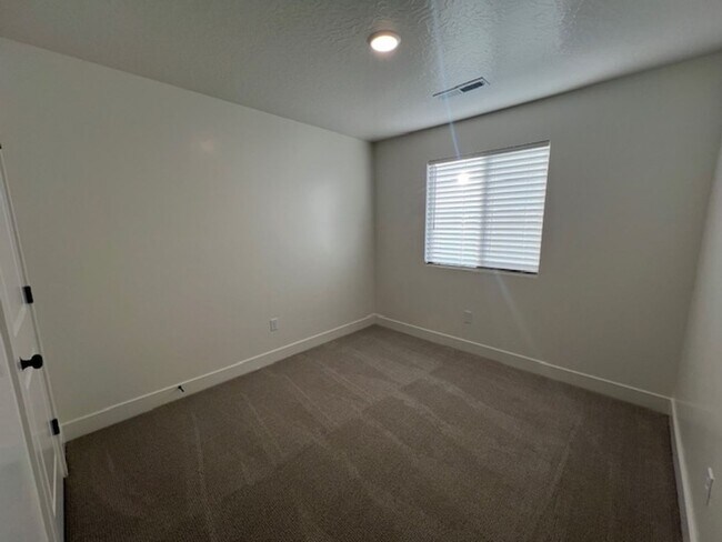 Building Photo - BRAND NEW South Desert Townhome with EVSE Outlet