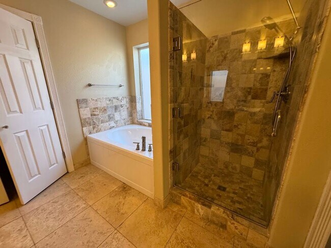 Building Photo - Spacious 4-Bedroom Home with Main-Level Primary Suite & 3-Car Garage