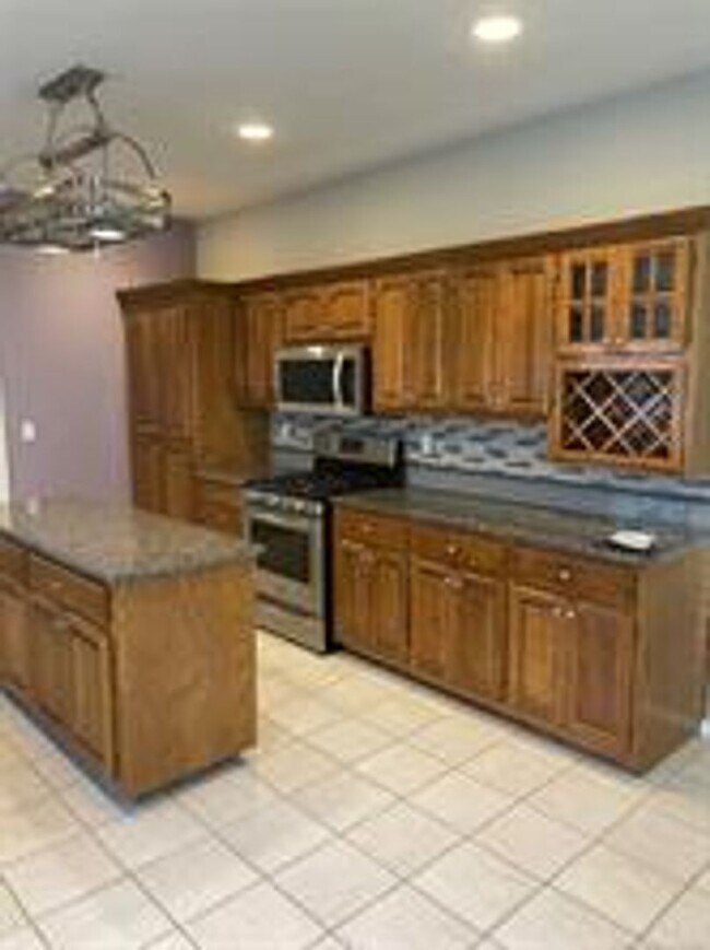 Building Photo - Beautifully kept 1.5 story home with 3 lg bedrooms (game room could be a 4th bedroom).