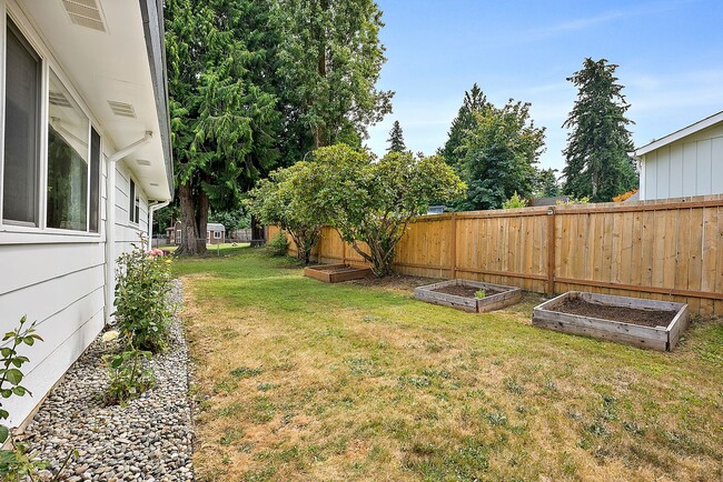 Building Photo - Woodland Creek Rambler on Corner lot with large yard