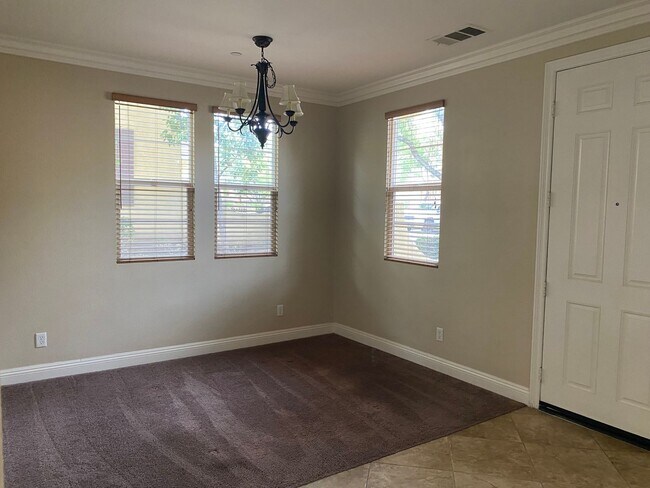 Building Photo - 3 bedroom/Patio 2 story, attached garage Great Access to the I215.