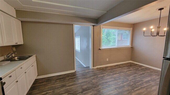 Building Photo - 8720 Marcella Ave