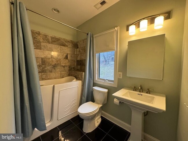 Building Photo - 6158 40 Winks Way