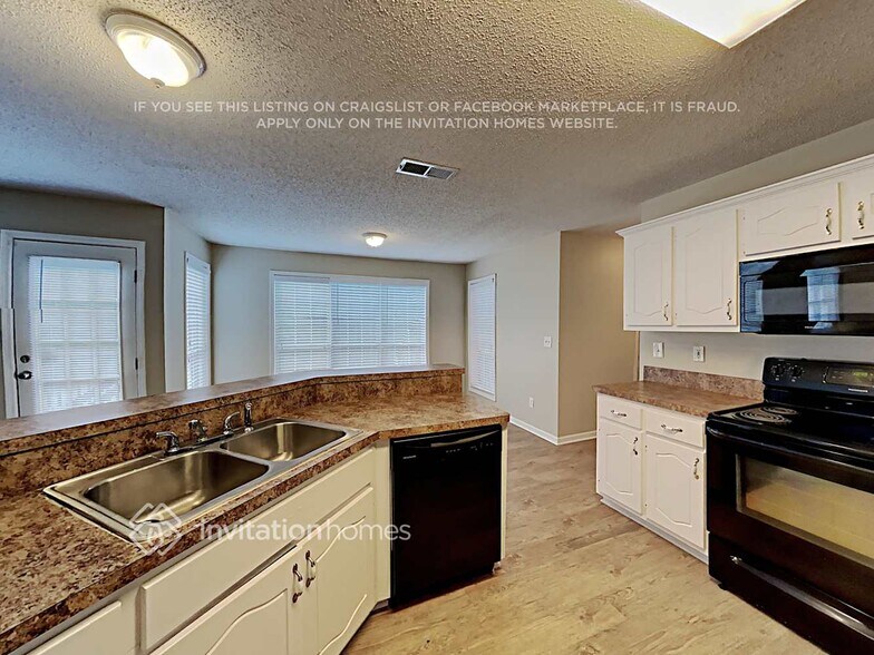 Building Photo - 7026 Coatsworth Dr