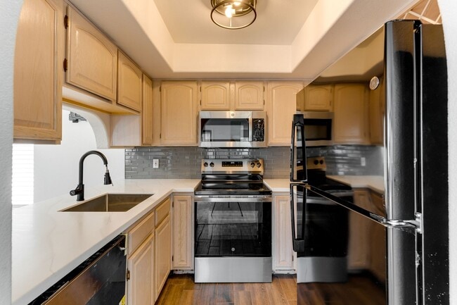 Building Photo - Stylish Remodeled 2-Bedroom Condo with Bal...