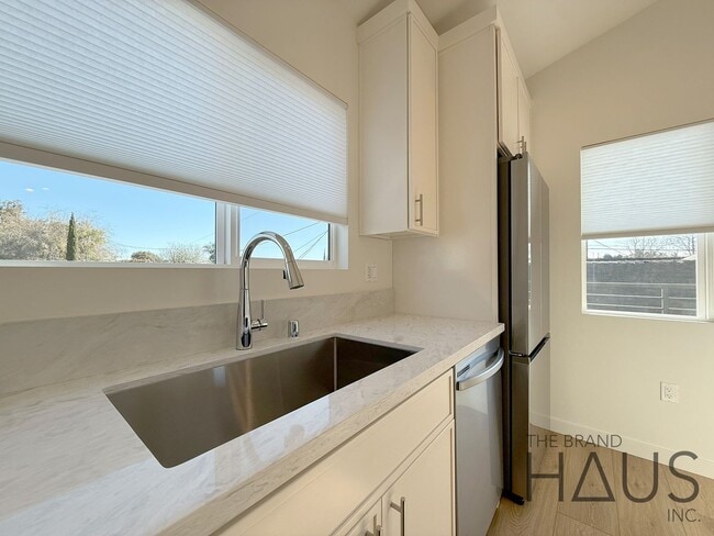 Building Photo - Brand-New 1-Bedroom, 1-Bathroom, 1-Compact Carport - Vaulted Ceilings in Belmont Heights