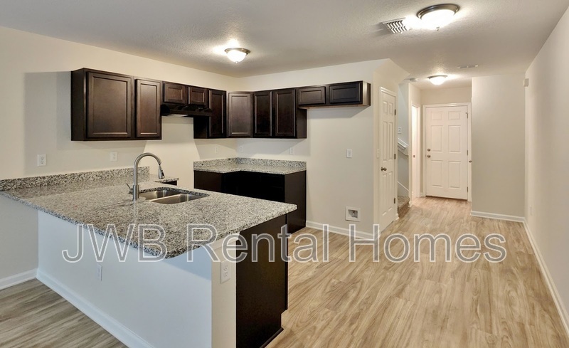 Building Photo - 8483 McGirts Village Ln