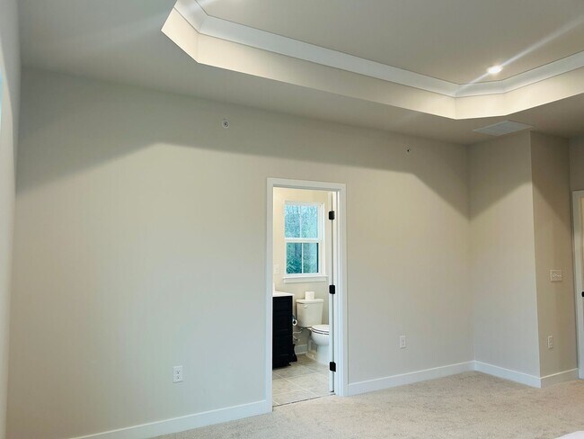 Building Photo - New Construction • 4 BR • 2 Full / 2 Half BA • End Unit Townhome in Village Town – Fayetteville’s...