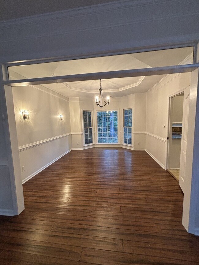 Building Photo - NEW TO MARKET: Cameron Woods Community!