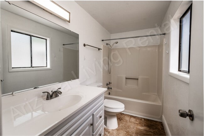 Building Photo - LARGE FENCED YARD WITH DETACHED GARAGE