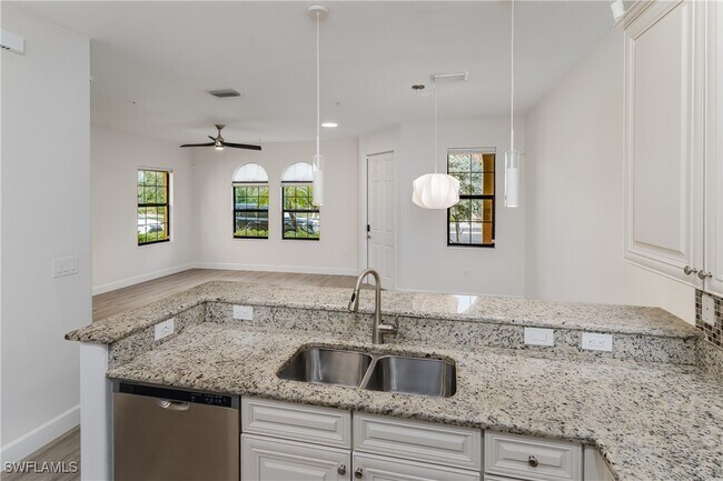 Building Photo - 9072 Covina Dr N