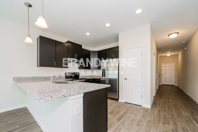 Building Photo - NEW LEASING SPECIAL: 1 MONTH CREDIT! 4BED ...