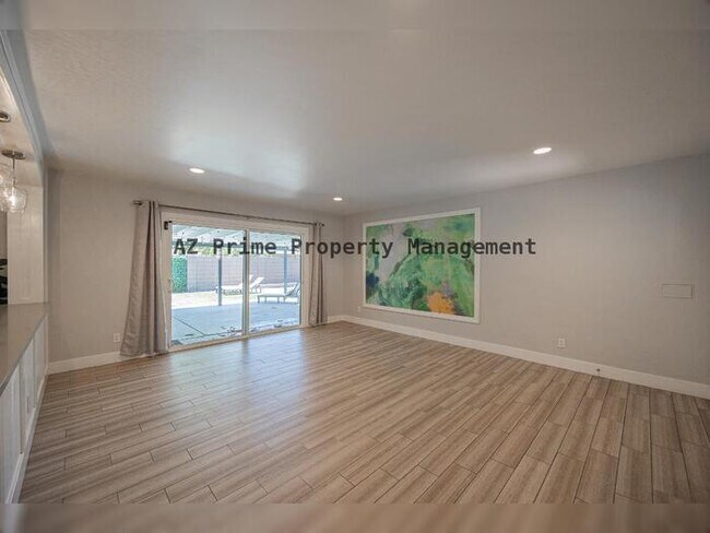 Building Photo - 8447 E Lewis Ave