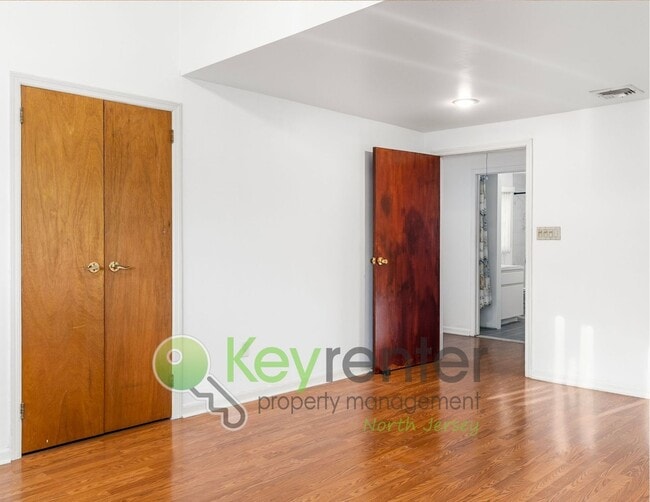 Building Photo - Spacious 2BR / 2.5BA Home with Huge Deck, Private Yard & Parking for 6