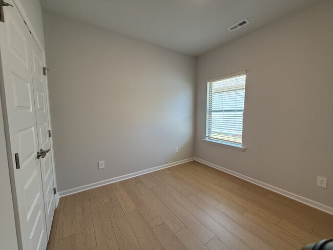 Building Photo - "NEWLY BUILT- Spacious 4-Bedroom Haven with Granite Elegance and Cozy Fireplace in Harvest"