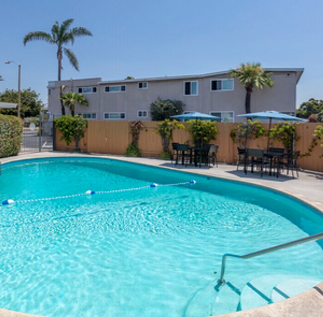 Building Photo - Welcome home to Seabreeze Garden Apartments