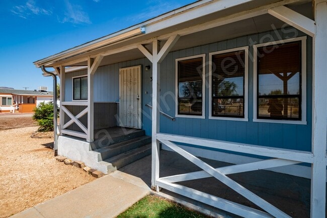Building Photo - LARGE FENCED YARD WITH DETACHED GARAGE