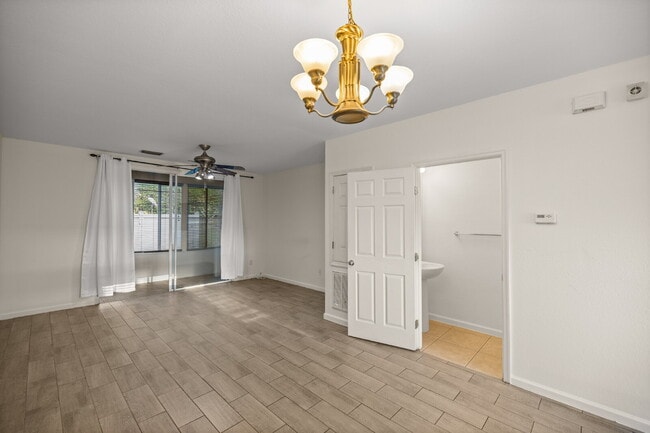 Building Photo - 2BR Townhome in Wynchase | Dual Suites + Screened Lanai