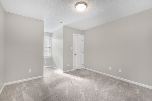 Building Photo - 3419 Pear Tree Court Unit A