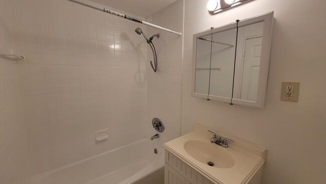 new re-surfaced tub & new cabinet - 58 Union St