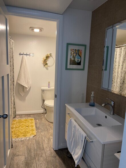 Downstairs bathroom with tub and shower combo - 70100 Mirage Cove Dr