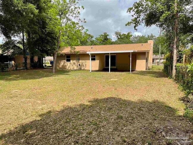 Building Photo - 6975 Woodley Dr